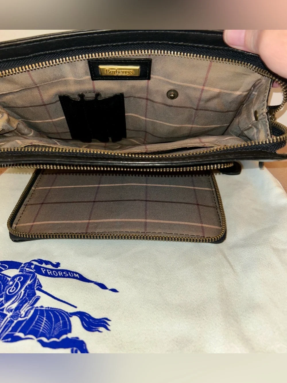 Burberrys pebbled leather crossbody / clutch bag from the pre-1999 era
